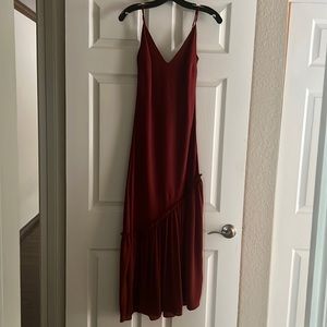 Frame slip dress with asymmetrical bottom